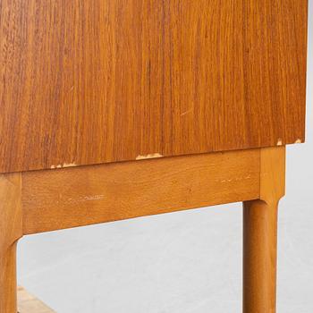 A teak veneered cabinet, mid 20th Century.