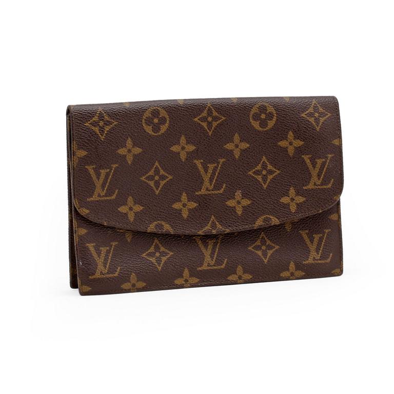 LOUIS VUITTON, a monogram canvas clutch.