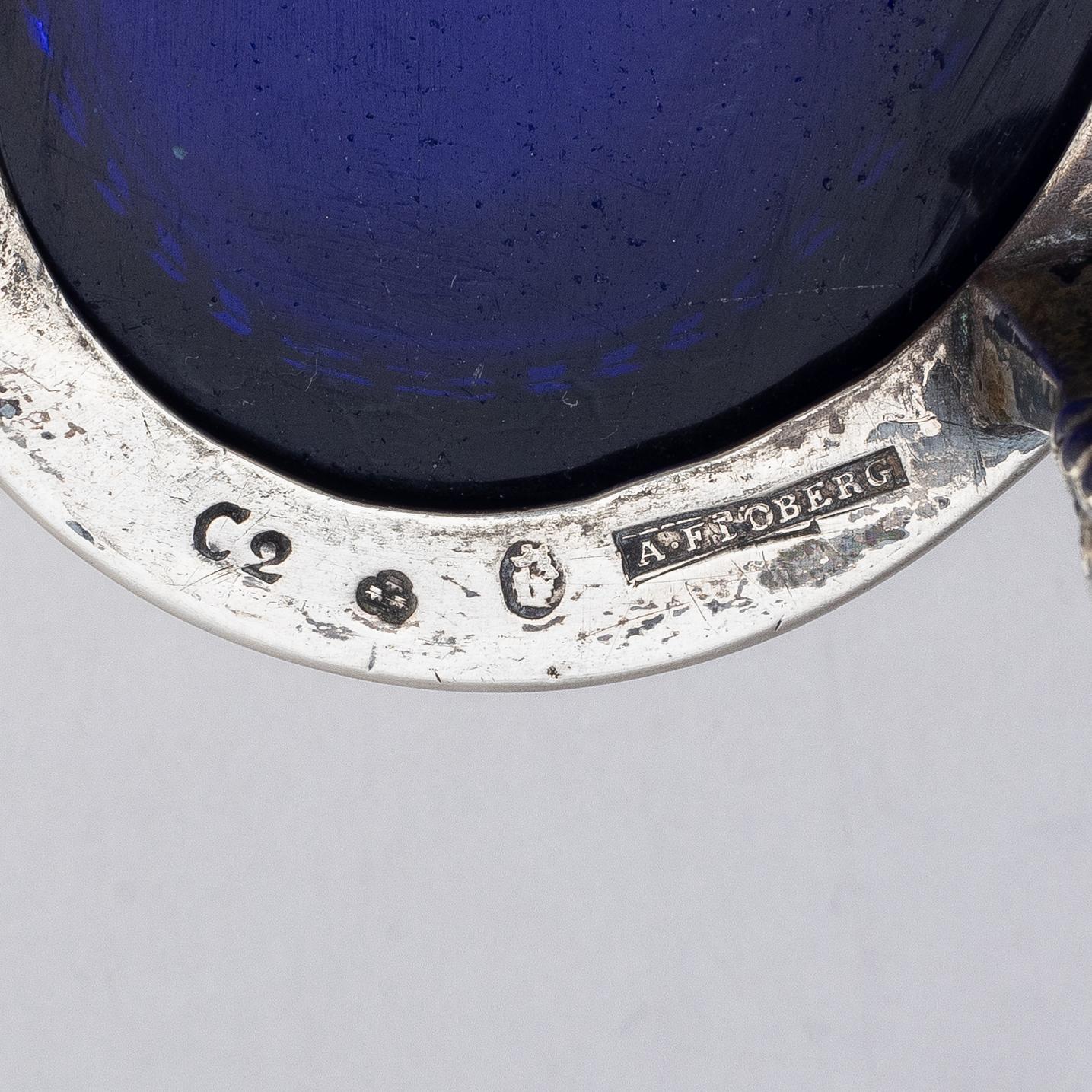 A pair of Swedish silver and glass salt cellars, marks of Arvid Floberg, Stockholm 1785.