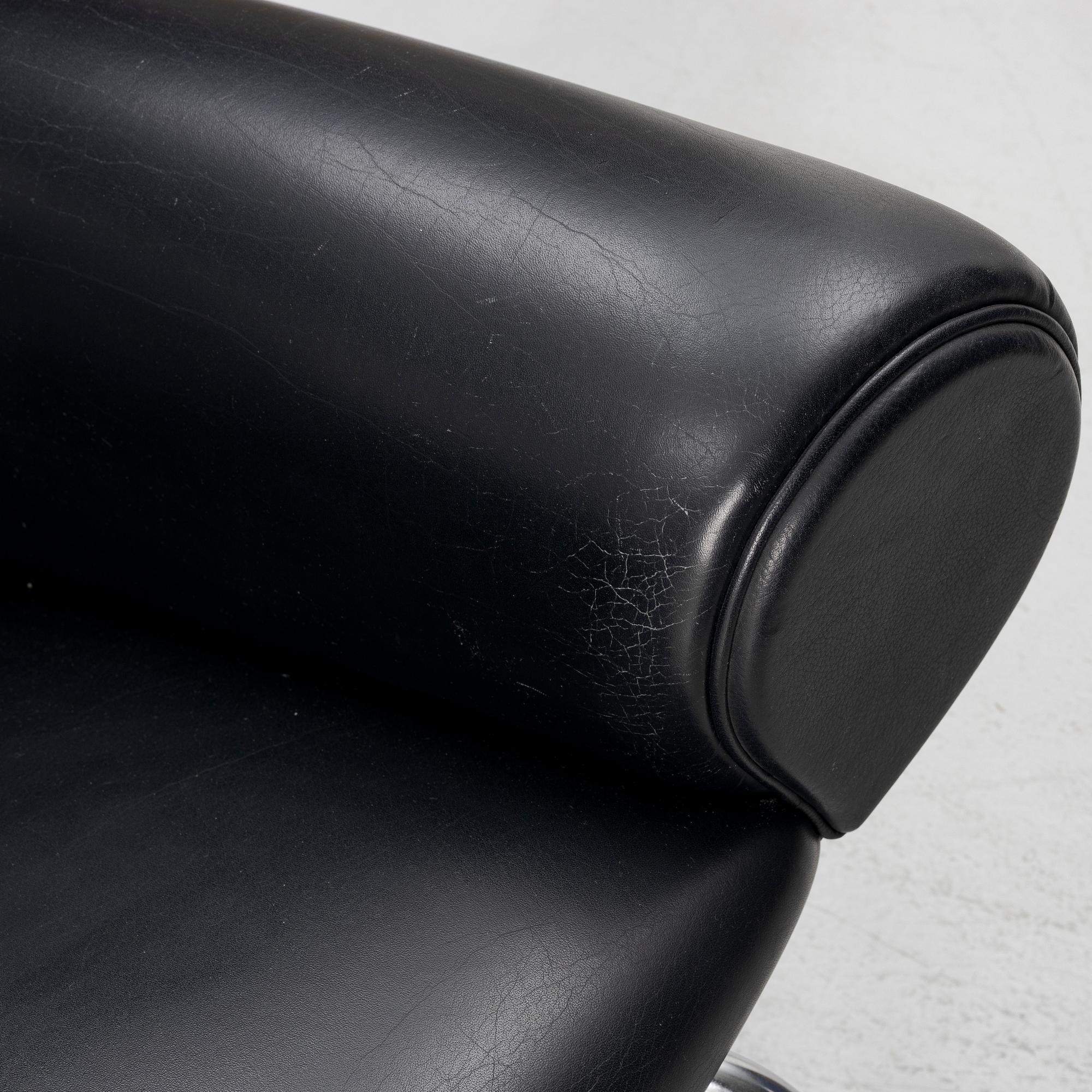 Hans J. Wegner, fåtölj med fotpall, "Ox Chair", EJ-100, Erik Jørgensen Møbelfabrik A/S, Svendborg, Danmark.