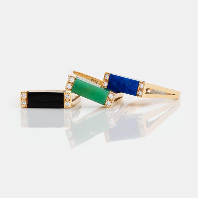 Three rings in 18K gold set with lapis lazuli, onyx and green quartz.