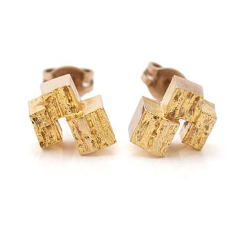 A pair of 18K gold earrings.