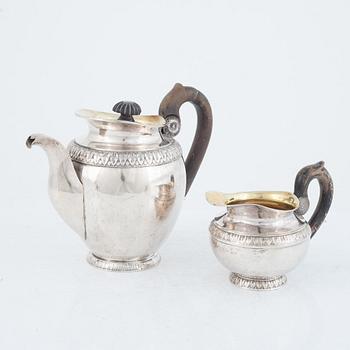 A Polish Silver Teapot and Creamer, Warsaw, 19th Century.