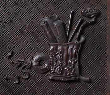 A carved wooden panel, Qing dynasty (1664-1912).