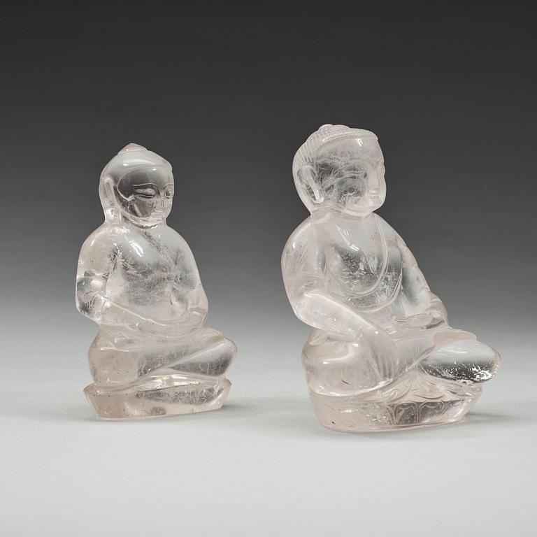 Two chinese rock chrystal figures of a seated buddha, circa 1900.