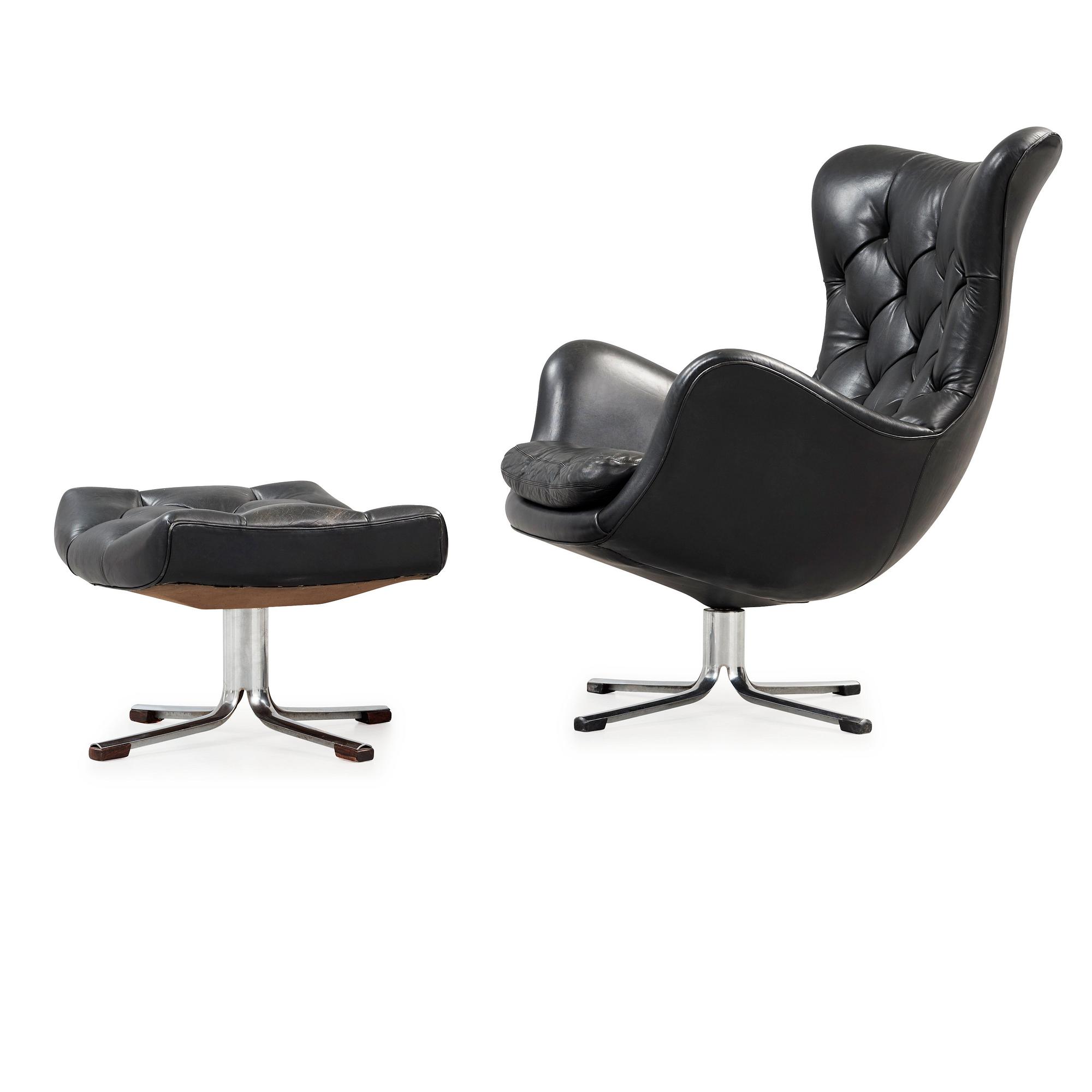 A Gustav Axel Berg 'Status' black leather easy chair with ottoman, Bröderna Andersson 1960's-70's.
