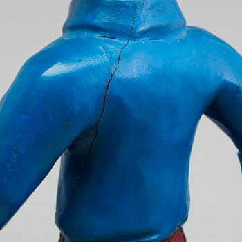 a Tintin and snowy wood scuplture from the second half of the 20th century.