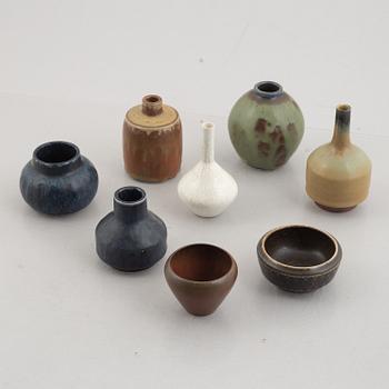 Carl-Harry Stålhane, seven stoneware vases and a bowl, Rörstrand 1950's/60's.