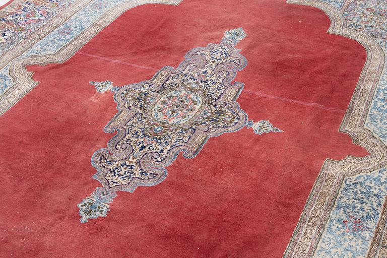 A Kerman carpet, c. 388 x 299 cm.