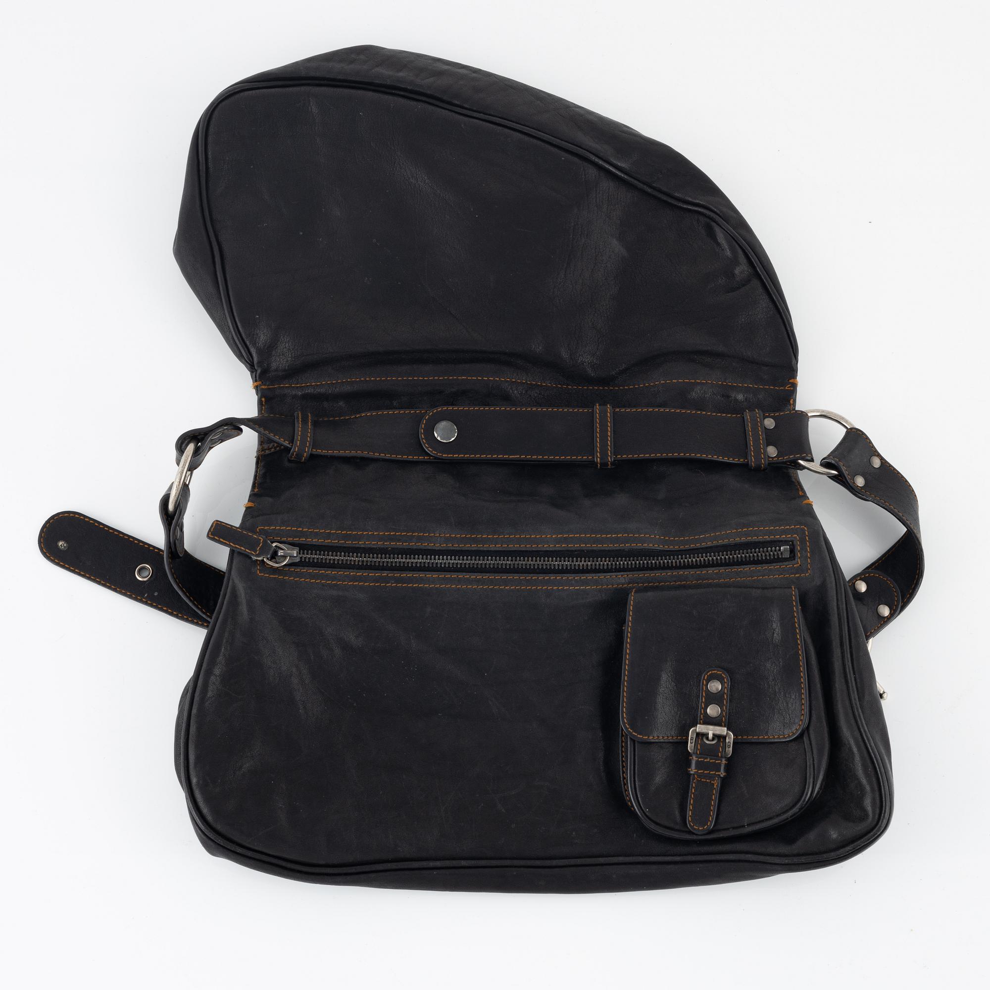 Christian Dior, a leather 'Gaucho saddle bag'.