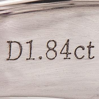 Sormus, 18K valkokultaa, timantteja n. 1,84 ct yht ja rubiini n. 3.50 ct.