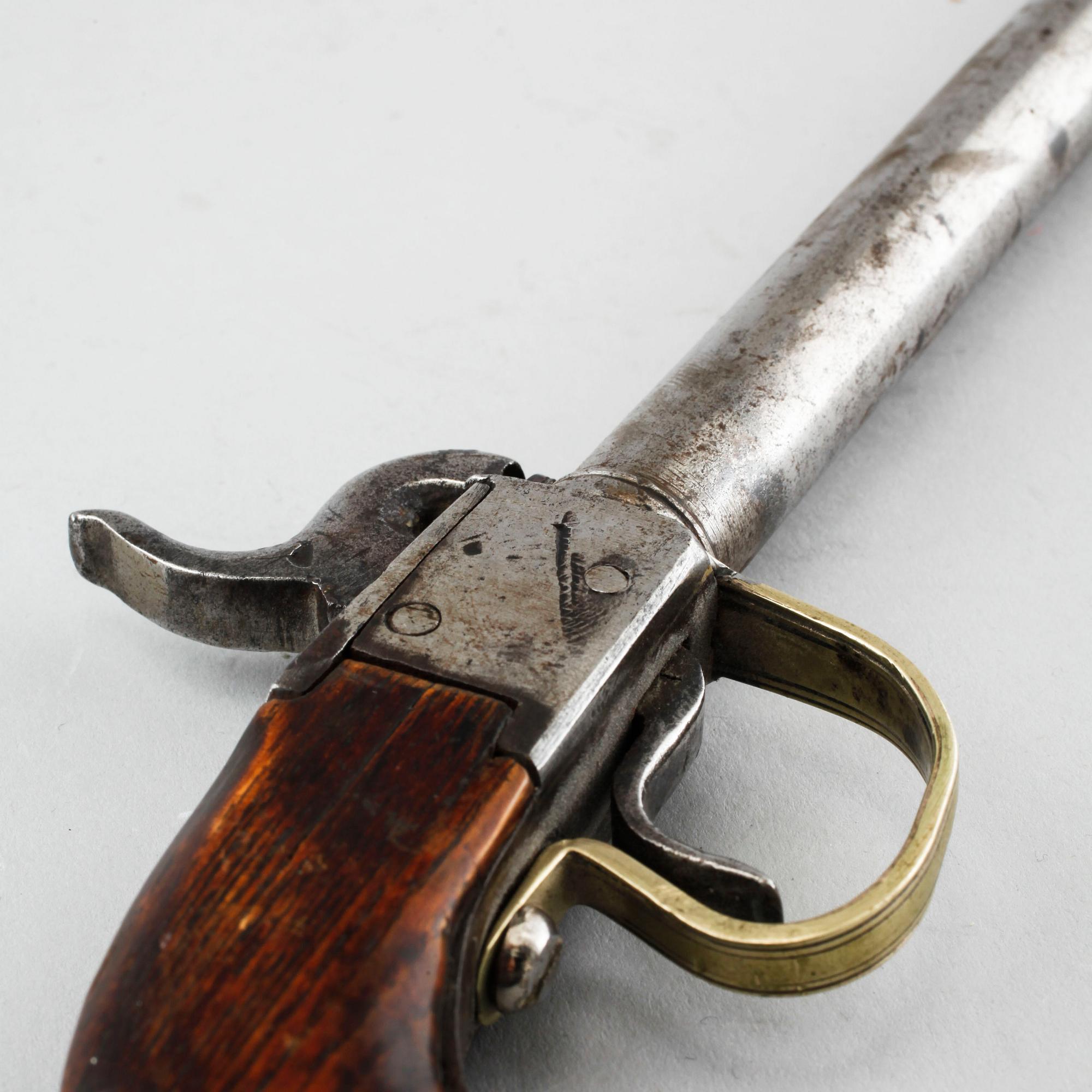 A 19th century caplock/percussion lock pistol.