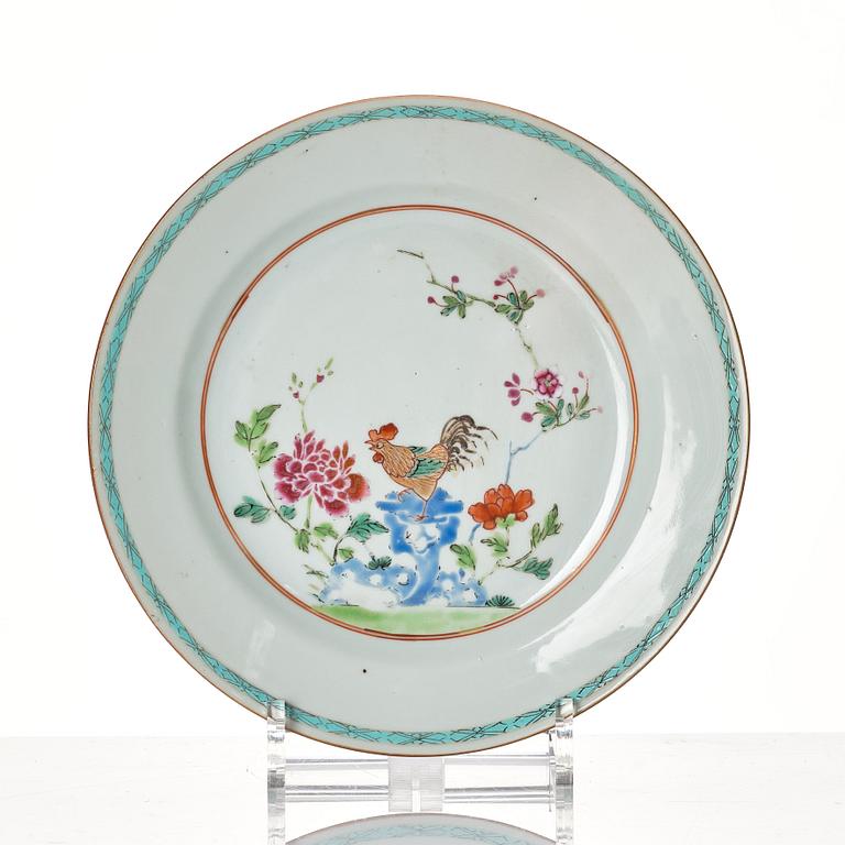 A set of 12 famille rose dinner plates, Qing dynasty, Qianlong (1736-95).