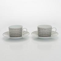Hermès, a pair of tea cups with saucers, "Mosaique au 24".