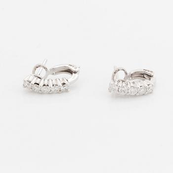 Brilliant-cut diamond earrings.