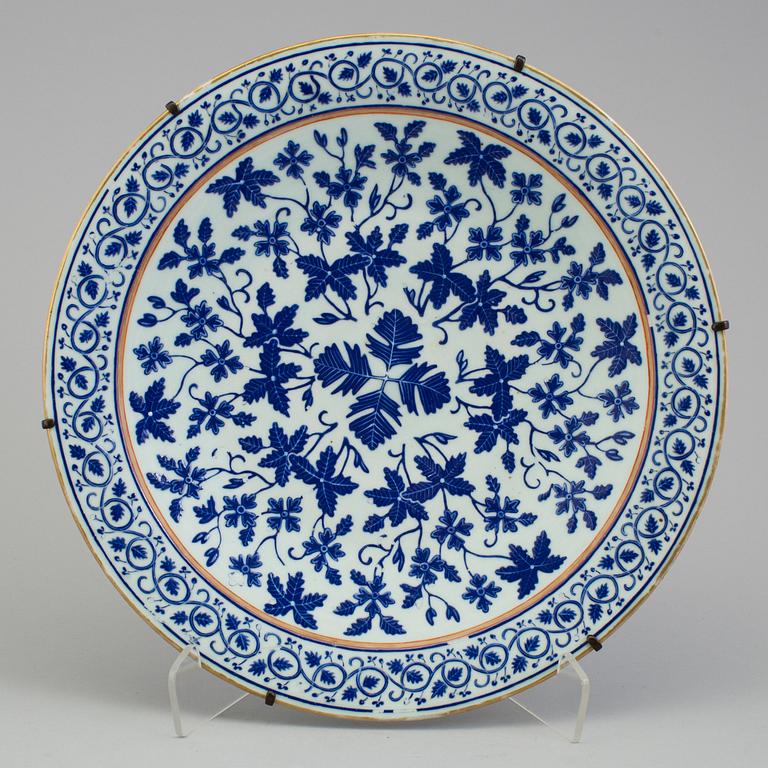 A Chinese blue and white porcelain charger, 20th century, with Guangxus six character mark.
