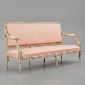 A Gustavian carved sofa, later part of the 18th century.