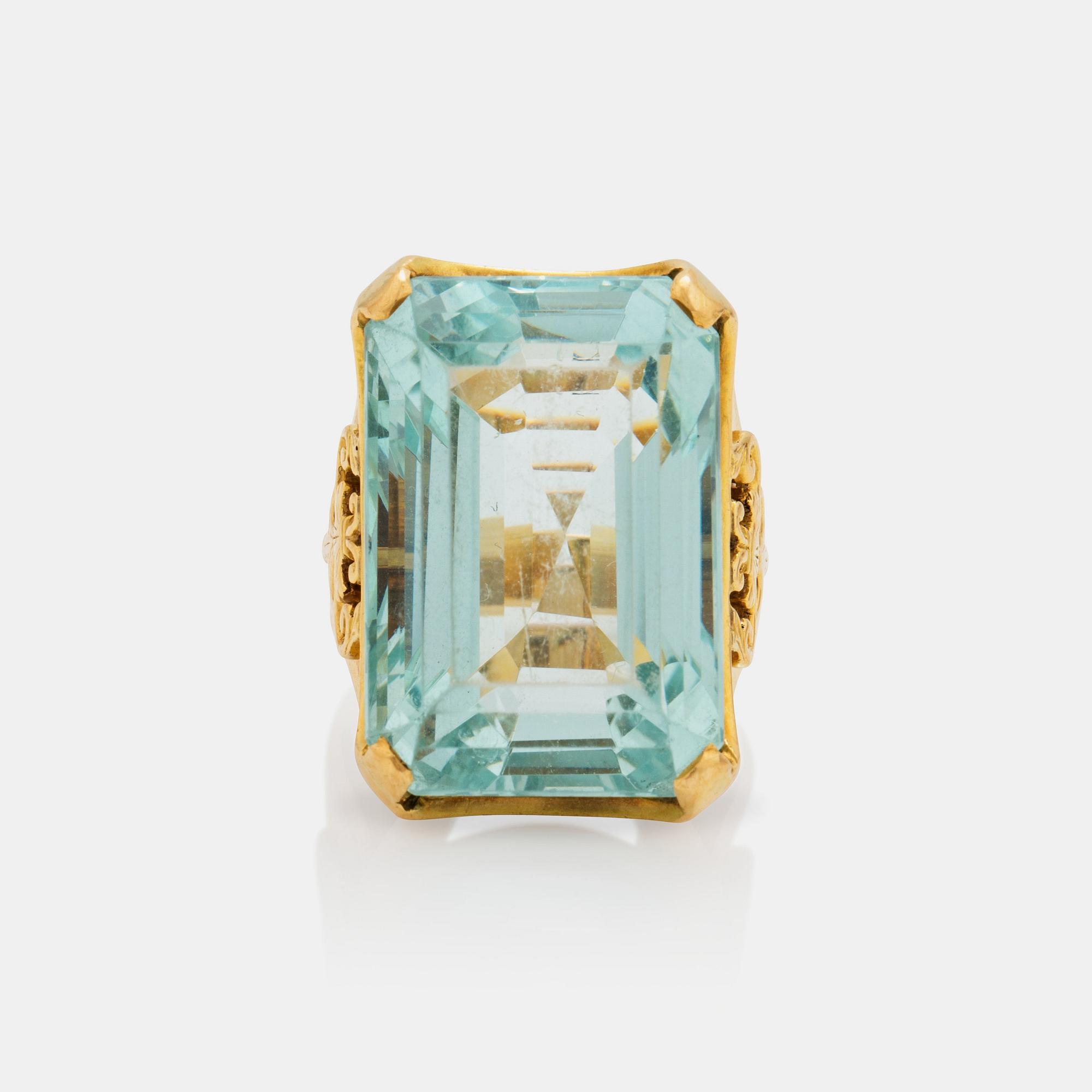 A circa 45.00 ct step cut aquamarine ring.