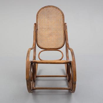 An early 20th century rocking chair.