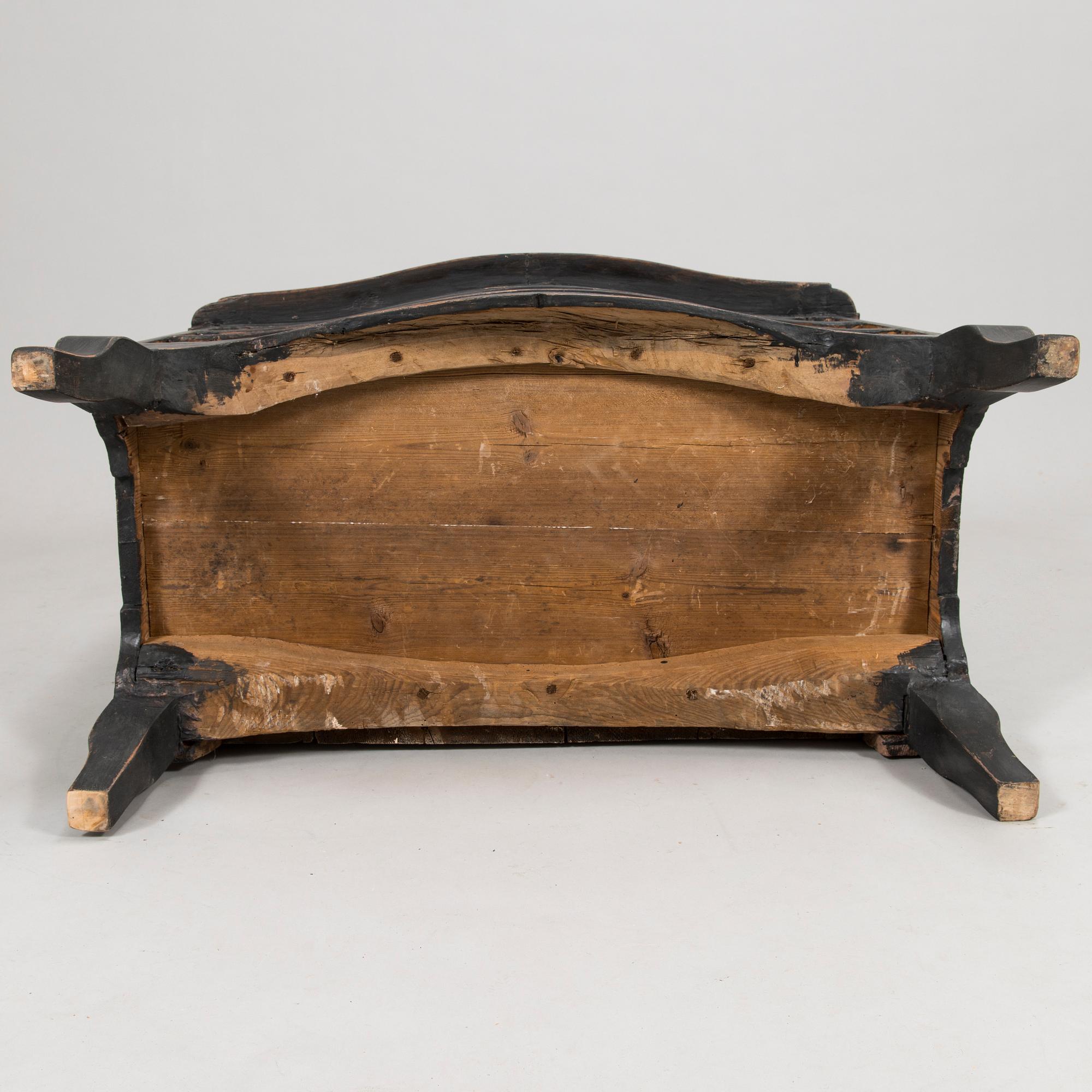 An 18th-Century chest of drawers.