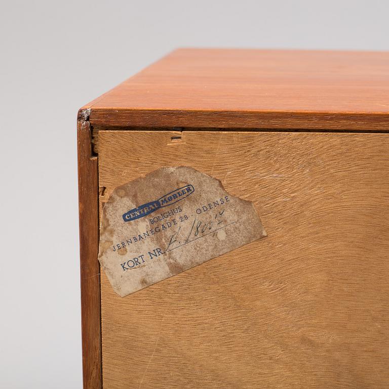 A second half of the 20th century teak veneered sideboard by Central Møbler Bolighus, Denmark.