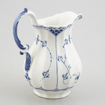 A 'Blue Fluted Half Lace' / 'Musselmalet' pitcher, Royal Copenhagen, model 667, 1898-1923.