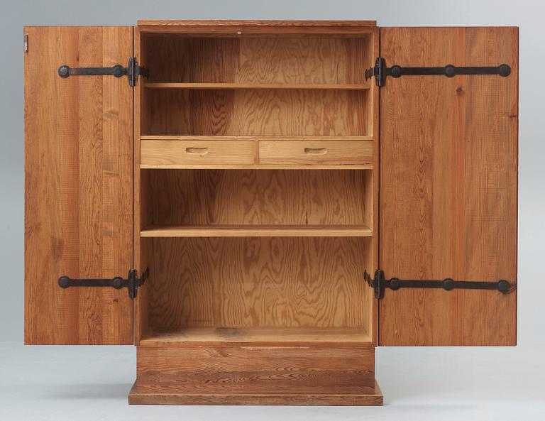 An Axel Einar Hjorth 'Lovö' stained pine cabinet, Nordiska Kompaniet, Sweden 1930's.