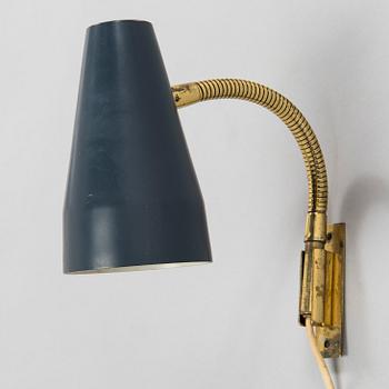 Lisa Johansson-Pape, a 1960's model '50-056' wall light for Stockmann Orno.