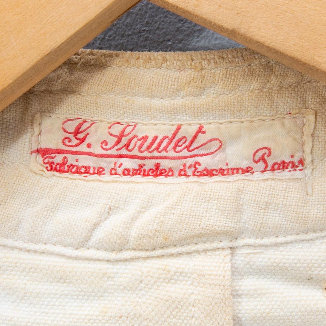 A French set of sword, mask and clothing for fencing, mid/second part of the 20th century.