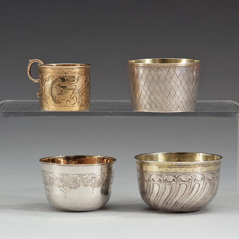 Four Russian 18th century parcel-gilt vodka-cups, unidentified makers marks, Moscow.