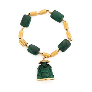 464. A 14K gold and malachite bracelet.