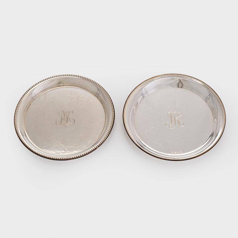 A set of twelve silver coasters and cocktail sticks 11 pcs,  Suomen Kultaseppä Oy 1935 and Kultakeskus 1983.