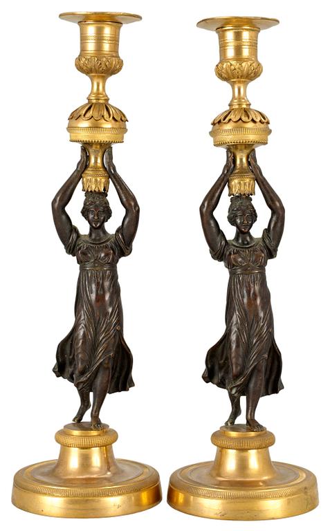 A pair of Empire candlesticks.