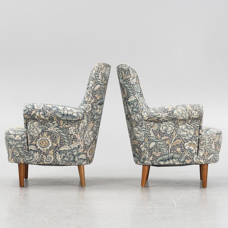Carl Malmsten, a pair of Hemmakväll easy chairs .