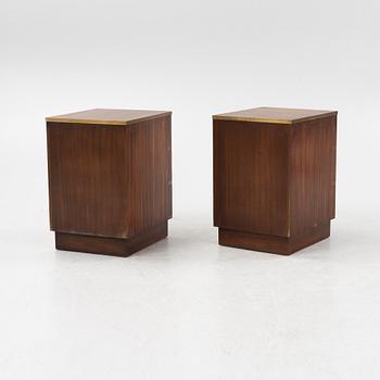 A pair of mahogany veneered bedside tables, Reprodux, England, second half of the 20th Century.