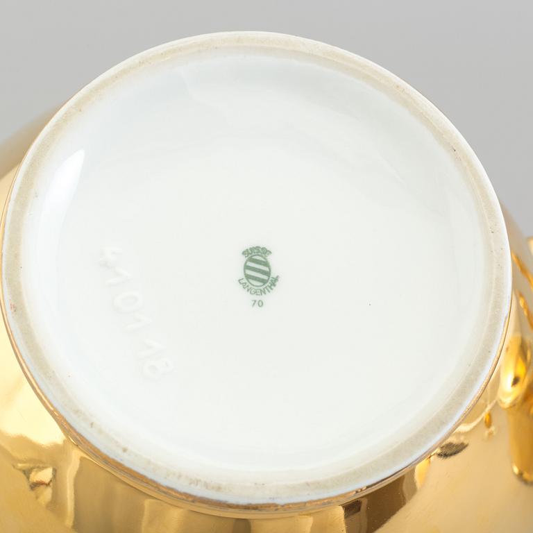 A mixed lot of thirteen pieces porcelain mostly Royal Worcester gold lustre, 20th century.