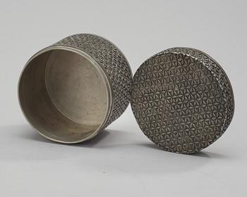 An Estrid Ericson trellice pattern pewter box by Svenskt Tenn.