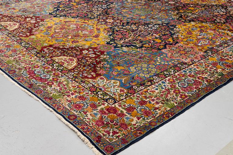 A carpet, semi-antique Kerman, ca 453 x 340 cm.