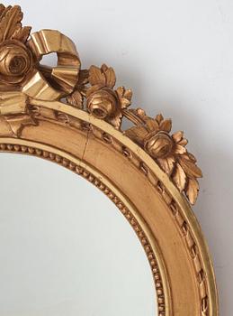 A Gustavian two-light girandole mirror.