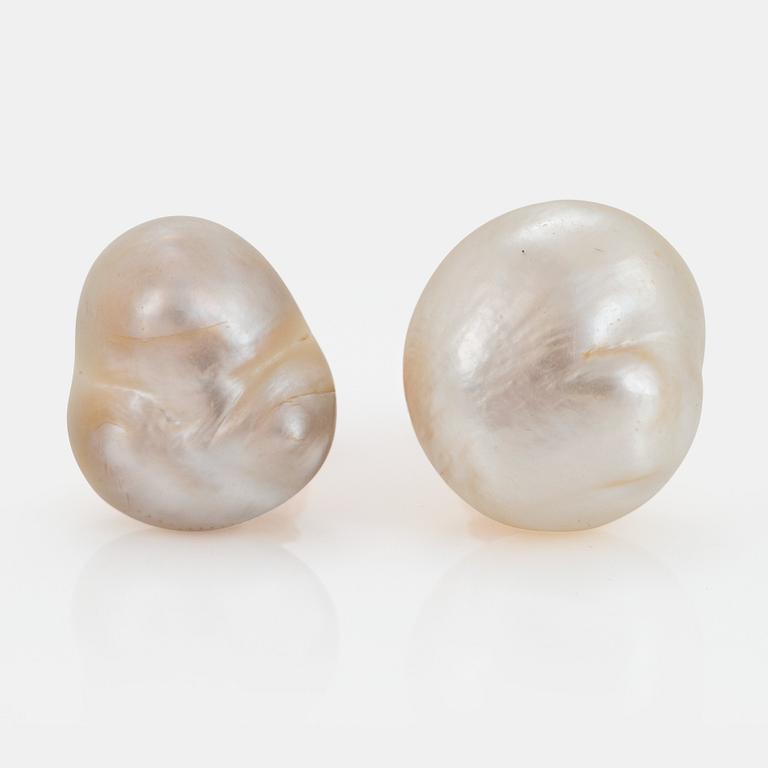 A pair of 18K gold earrings set with baroque pearls.