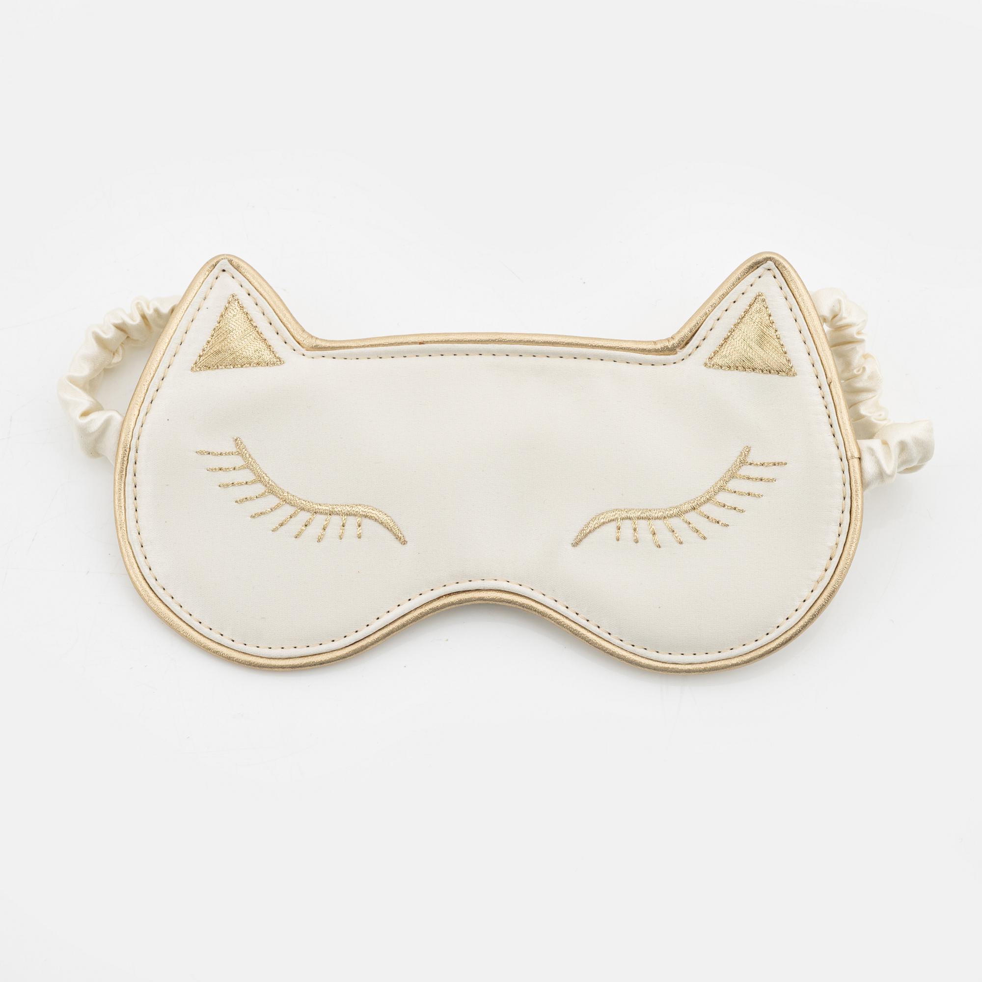 Charlotte Olympia, a pair of 'Cat nap' silk flats, a sleeping mask and a toilet bag, size S.