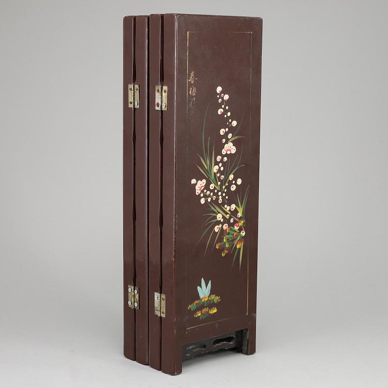 A four fold table screen, China, 20th Century.