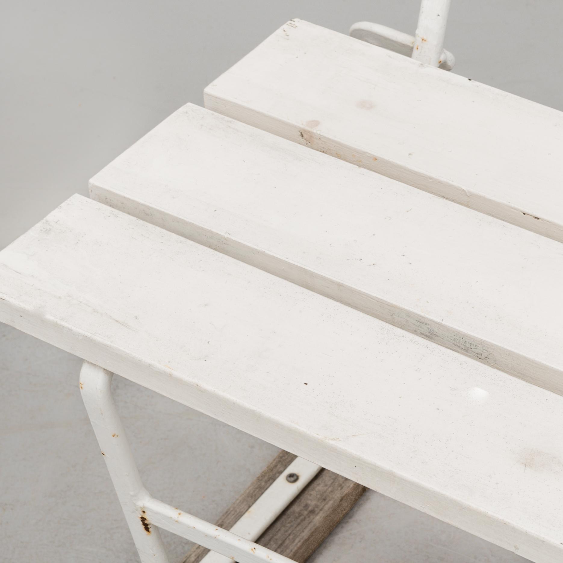 A mid 20th century garden sofa by Grythyttan.