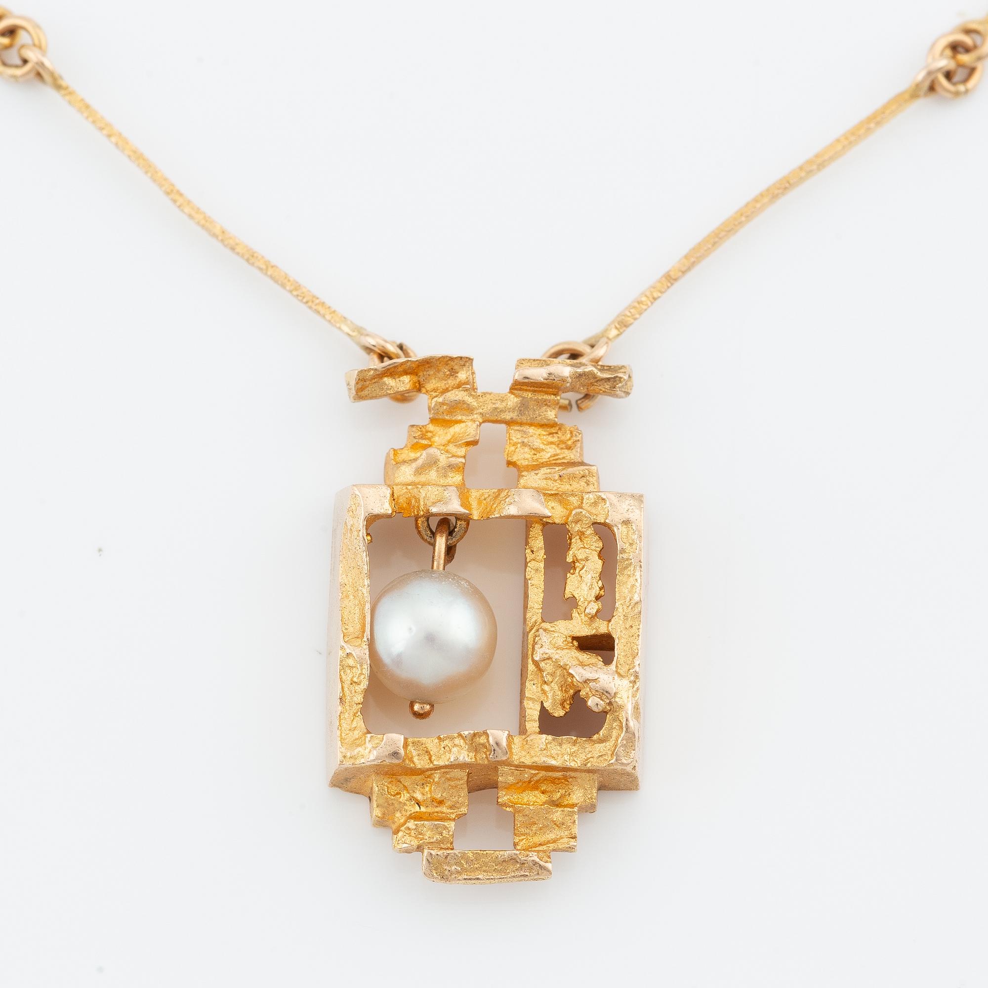 Lapponia, 14K gold necklace with a cultured pearl, designed by Björn Weckström "Magical Pearl".