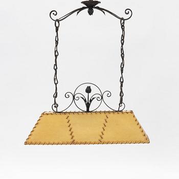 A chalet style mid century modern ceiling lamp.