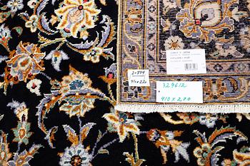 A Kashan carpet, signed, c. 410 x 270 cm.