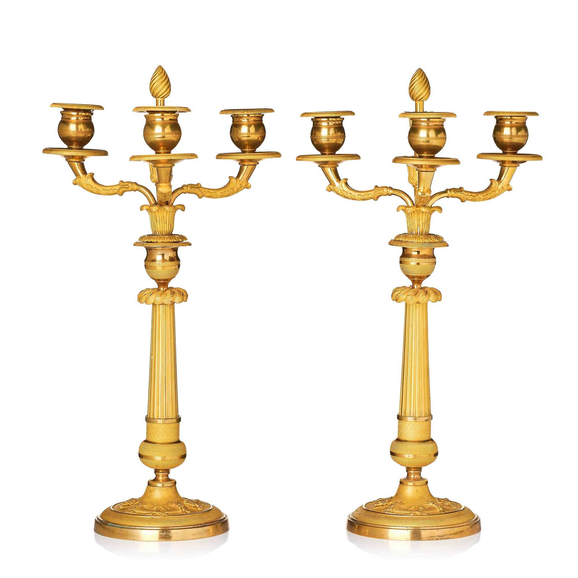A pair of Empire ormolu three light Candelabra.