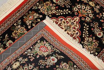 A pair of Tabriz rugs, part silk, so-called 50 Raj, 92 x 62 cm.