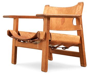 A Børge Mogensen oak and leather 'Spanish Chair' by Fredericia Stolefabrik, Denmark.