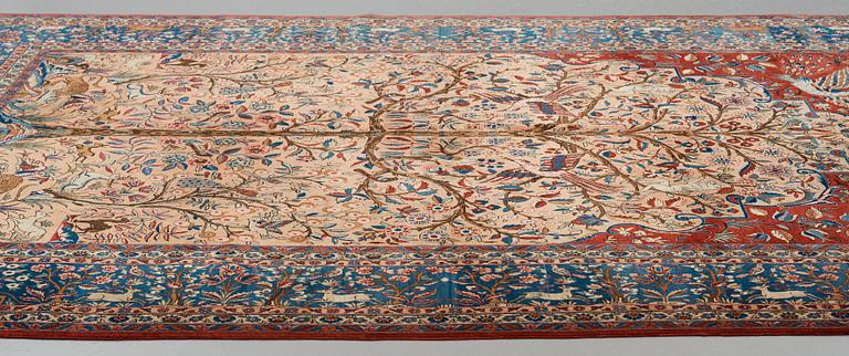 A carpet, a semi-antique Kashan, a so called Dabir, ca 383,5-387,5 x 269,5-275 cm.